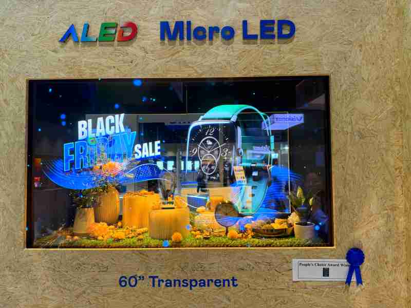 龙门国际60吋高透明度Micro LED显示器获”最佳Micro LED技术应用奖”，，，，将Micro LED面板透明化之设计特性极致发挥，，，以可扩展性无缝拼接技术打造，，，，具备600 nits全画面亮度、、、、大于60%穿透率及超过NTSC 110%的优异广色域表现，，，，可依需求灵活应用于各种场域